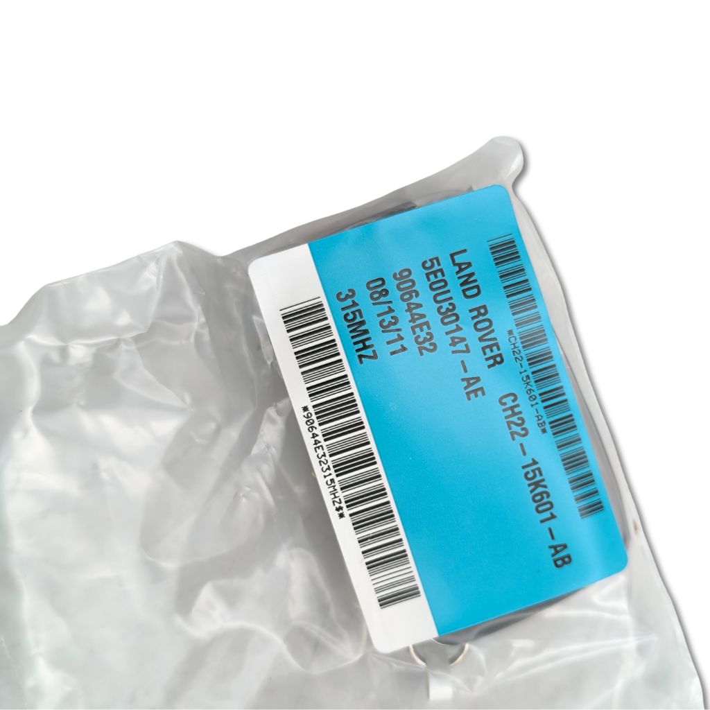 Chiave telecomando Land Rover OEM LR029695 con codice a barre, componente originale per veicoli Land Rover.
