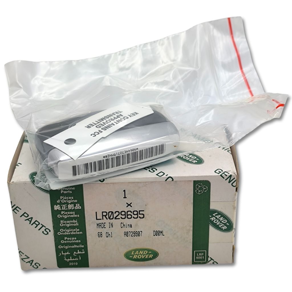 Chiave telecomando Land Rover LR029695 con etichetta, componente OEM per sistema di apertura e avviamento.